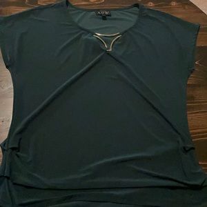 Green blouse with gold metal accent